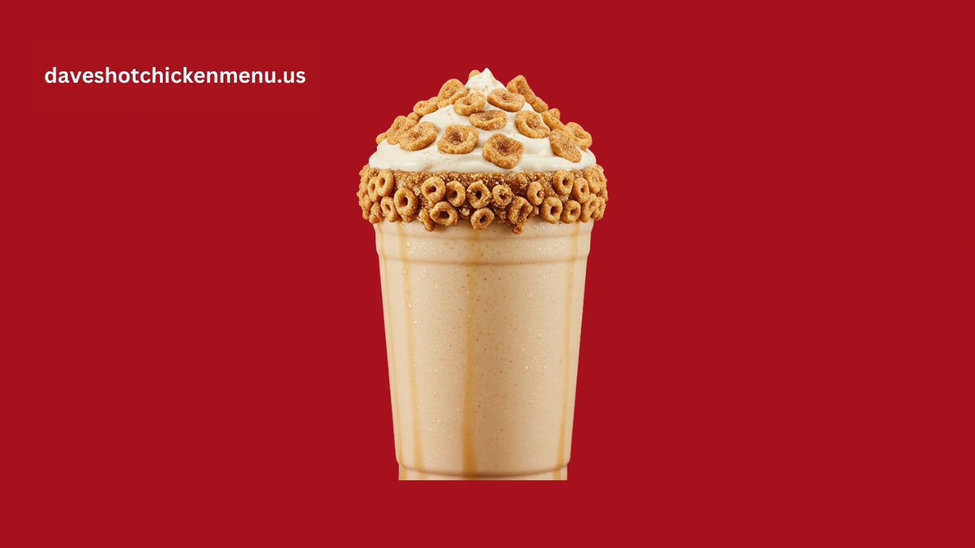Large Cinnamon Toast Crunch milkshake loaded with crunchy cereal and whipped cream in a tall glass