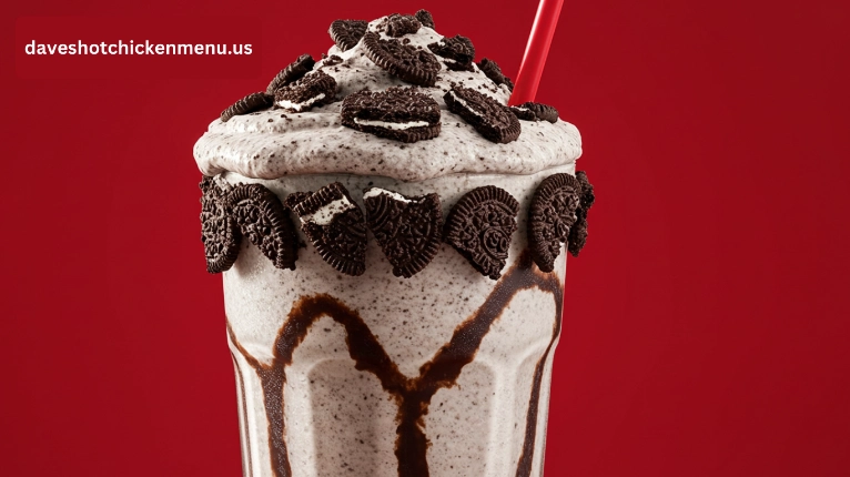 Oreo top loaded shake with whipped cream, Oreo crumbs, and a whole Oreo cookie.